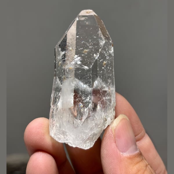 Tip-and-face chip Xuebaoding quartz — alternate view