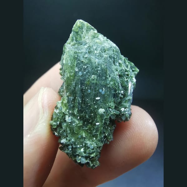 Green epidote with datolite balls from Shijiangshan — detail view