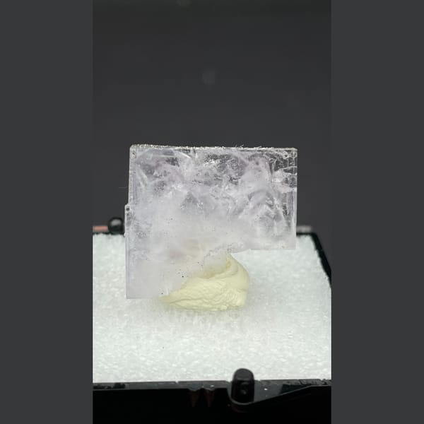 Clear glassy fluorite crystal with inner flower patterns from Zhejiang — alternate view