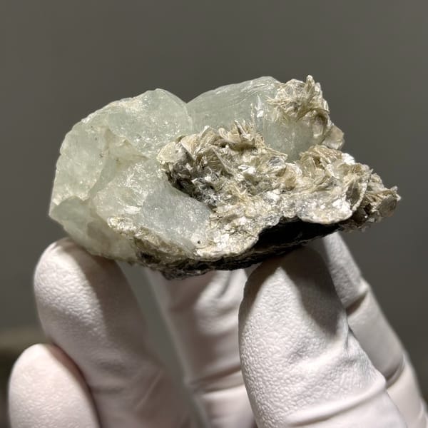Xuebaoding aquamarine with mica C — alternate view