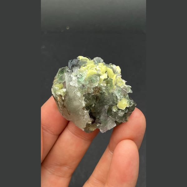 Pale green fluorite with quartz, black tourmaline and mica from Namibia — detail view
