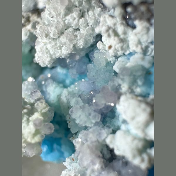Blue-White Gibbsite with Purple and Green Inclusions Guizhou 5.0 cm — detail view
