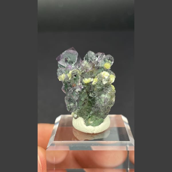 Clear faintly lilac fluorite with yellow mica from Namibia — alternate view