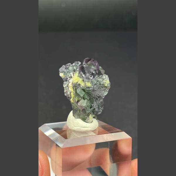 Clear faintly lilac fluorite with yellow mica from Namibia — detail view