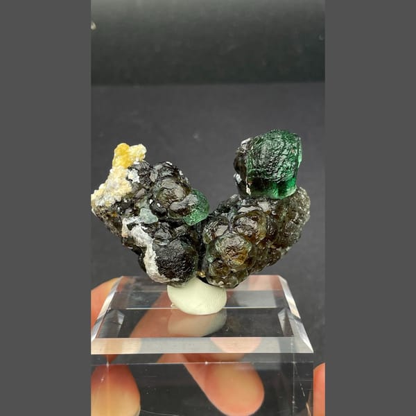 Vivid glass-green fluorite with mica from Namibia — complete view