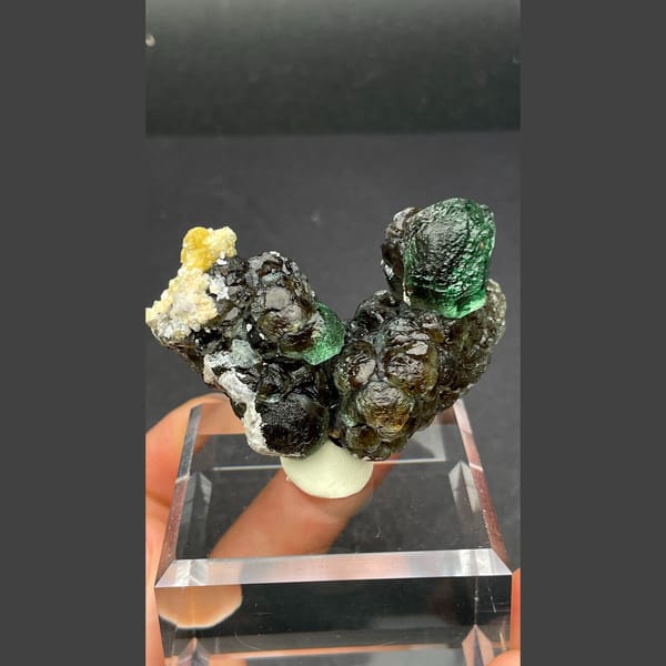 Vivid glass-green fluorite with mica from Namibia — alternate view