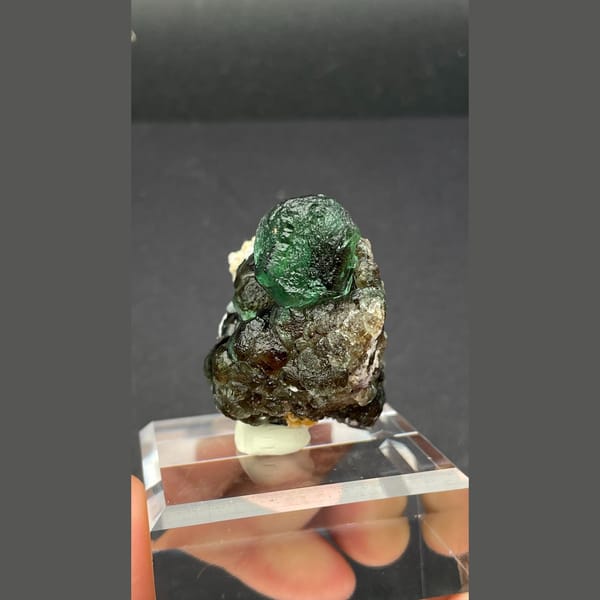 Vivid glass-green fluorite with mica from Namibia — alternate view