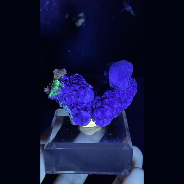 Vivid glass-green fluorite with mica from Namibia — detail view