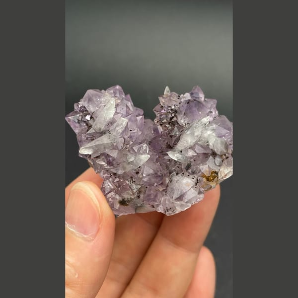 Lilac amethyst crystal group with calcite from Brazil — alternate view