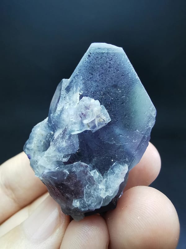 Complete front view of the frosted blue-purple fluorite cluster