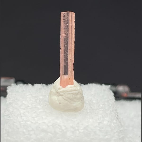 Tiny pink vayrynenite from Pakistan — detail view