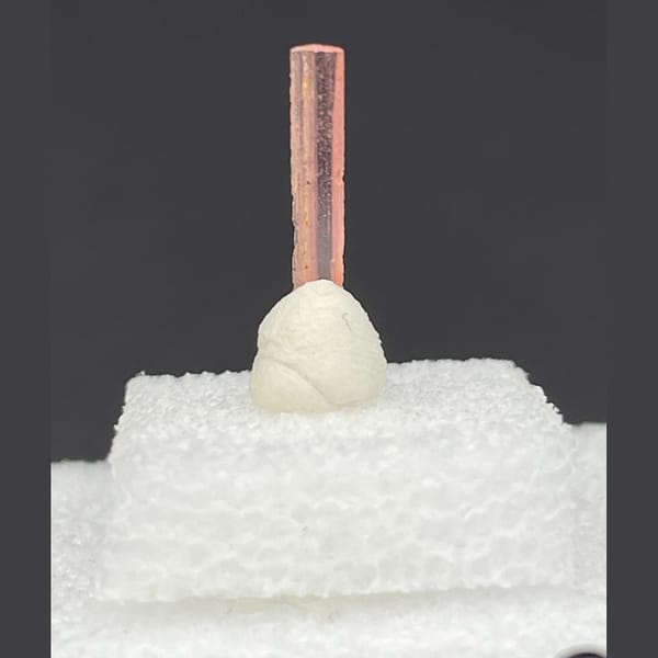 Tiny pink vayrynenite from Pakistan — detail view
