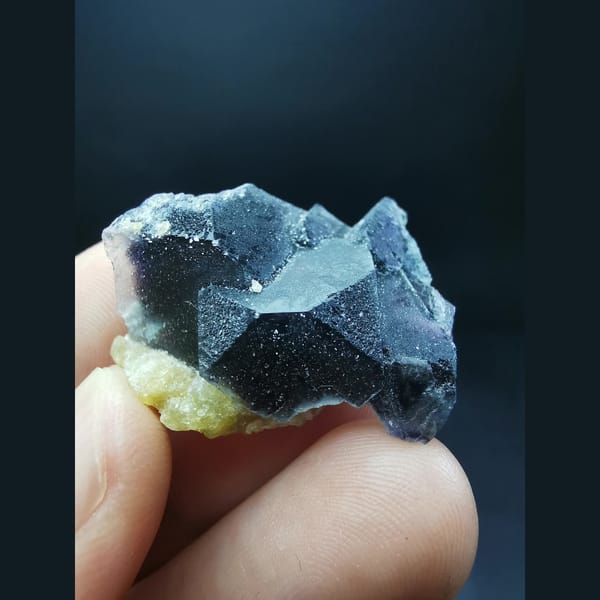 Purple fluorite with mica — complete view