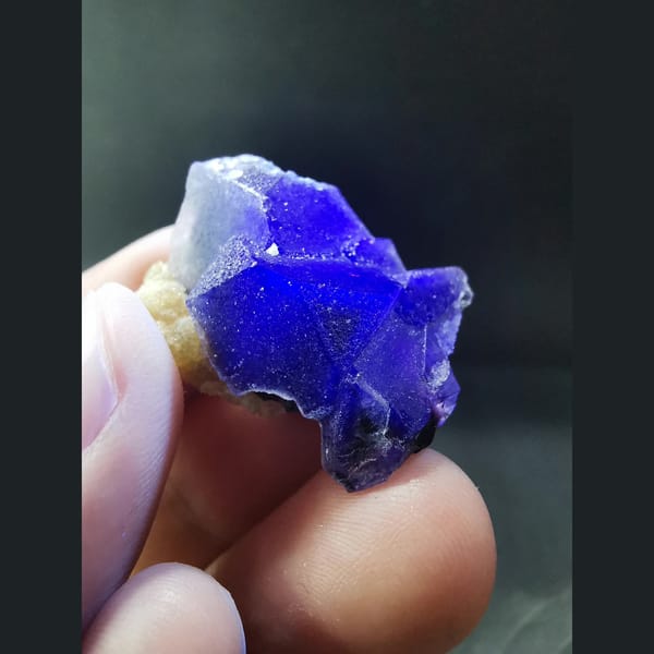 Purple fluorite with mica — detail view