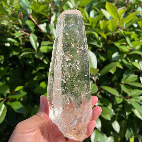 Tall near-clean clear Himalayan quartz crystal — detail view