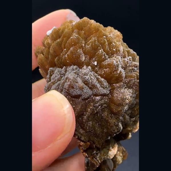 Pale pink stilbite from Yunxiao — detail view