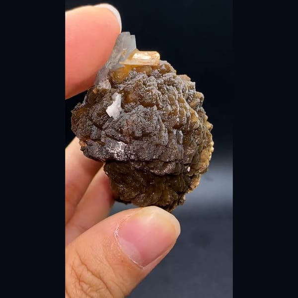 Pale pink stilbite from Yunxiao — detail view