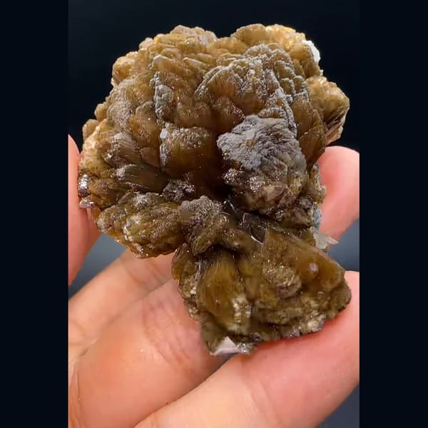 Pale pink stilbite from Yunxiao — detail view