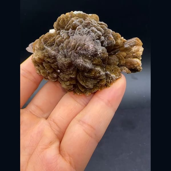 Pale pink stilbite from Yunxiao — detail view