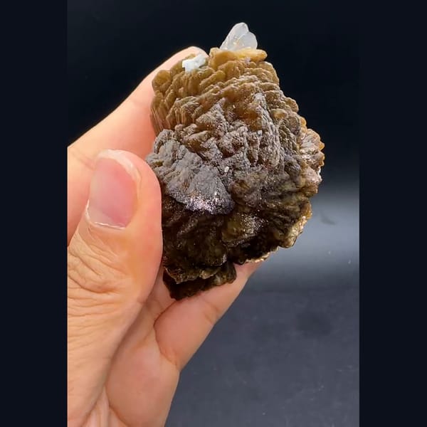 Pale pink stilbite from Yunxiao — detail view