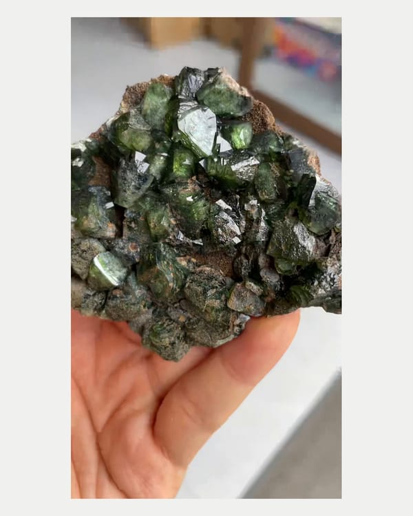 Complete reverse view of green ludlamite crystal cluster
