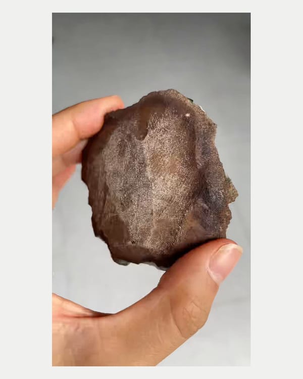 Complete right oblique view of green ludlamite crystal cluster