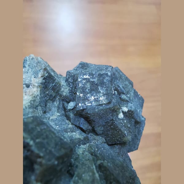 Green andradite cluster with grid-patterned faces — alternate view