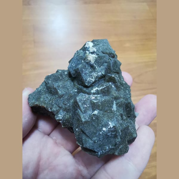 Green andradite cluster with grid-patterned faces — alternate view