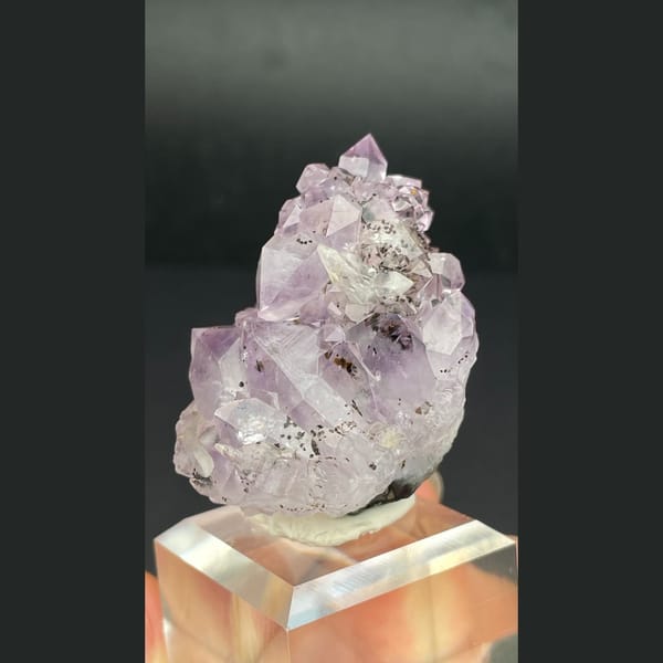 Pale lilac amethyst crystal cluster with calcite from Brazil — alternate view