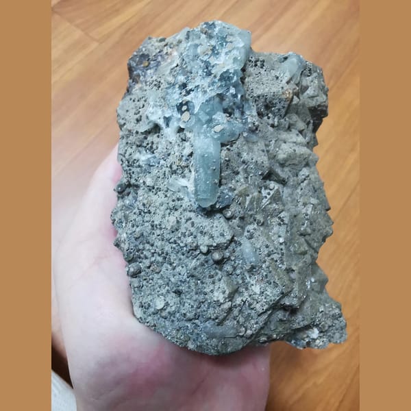 Large brown-green andradite with green quartz and goethite — alternate view