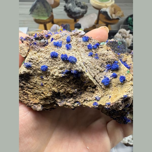 Deep blue azurite spheres with gibbsite on matrix from Qinglong, Guizhou — alternate view