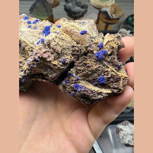 Deep blue azurite spheres with gibbsite on matrix from Qinglong, Guizhou — alternate view