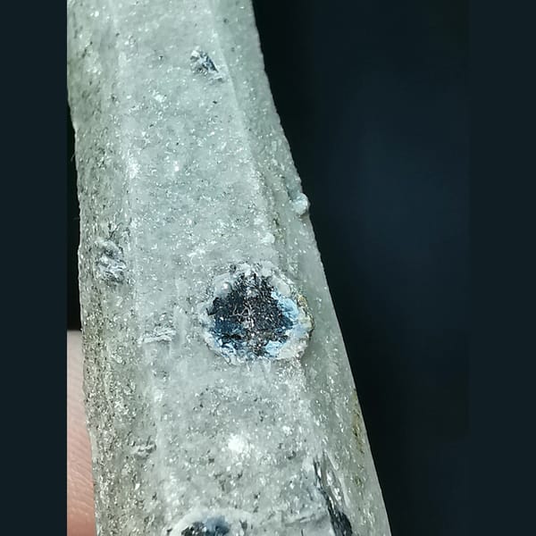 Sparkly quartz with specular hematite flowers — alternate view