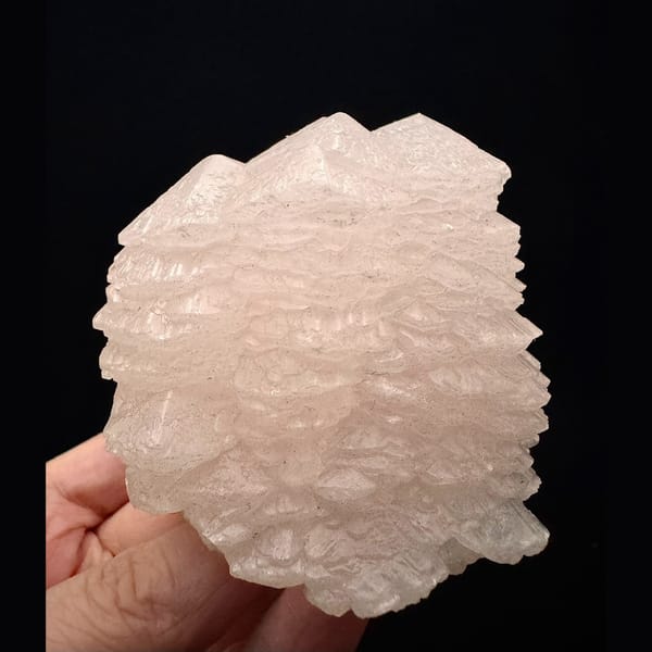 Layered pink manganoan calcite from Daye, Hubei — complete view