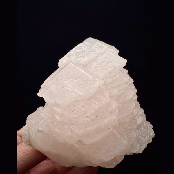 Layered pink manganoan calcite from Daye, Hubei — alternate view