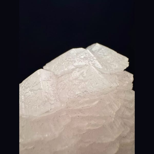 Layered pink manganoan calcite from Daye, Hubei — detail view