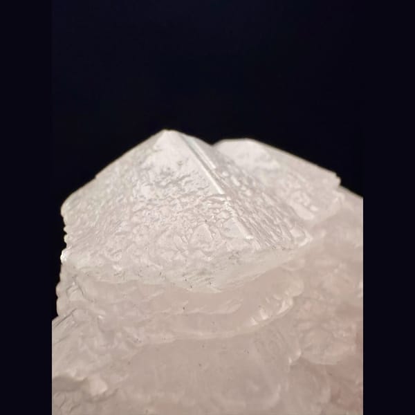 Layered pink manganoan calcite from Daye, Hubei — detail view