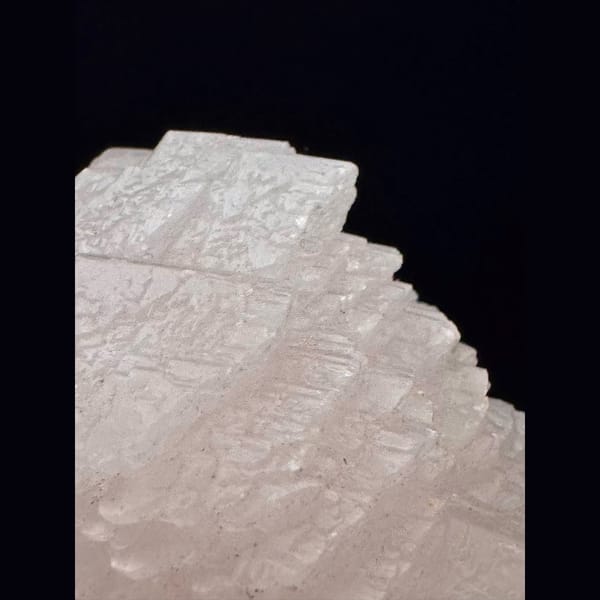 Layered pink manganoan calcite from Daye, Hubei — detail view