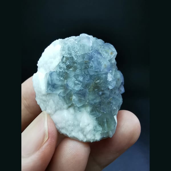 Blue fluorite sheet on candle quartz — alternate view