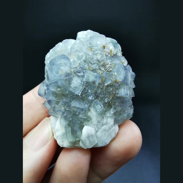 Blue fluorite sheet on candle quartz — detail view