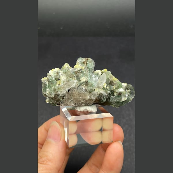 Yellow-green fluorite with quartz and mica from Namibia — detail view