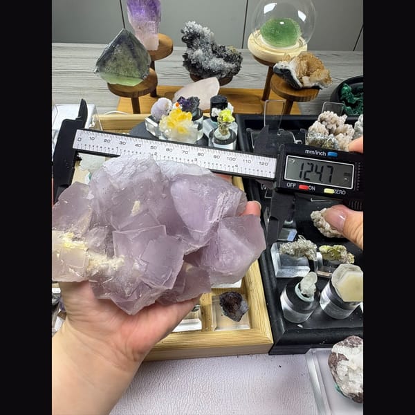 Large heavy cluster of soft lilac fluorite — alternate view