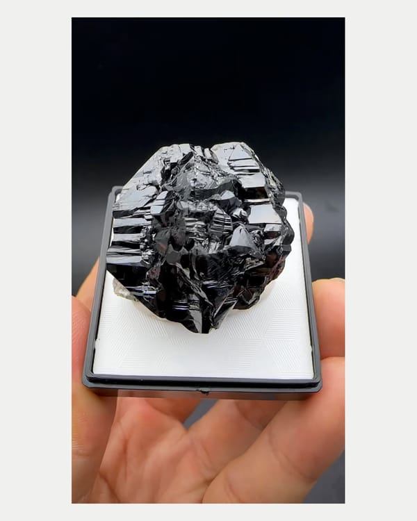 Complete front view of lustrous Xuebaoding cassiterite cluster