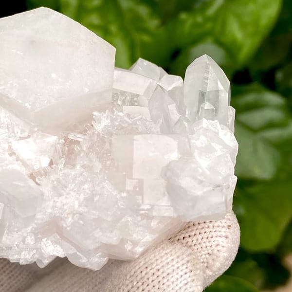 Pale pink hexagonal biscuit calcite with clear quartz — alternate view