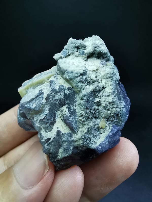 Complete reverse view showing the natural matrix and fluorite base