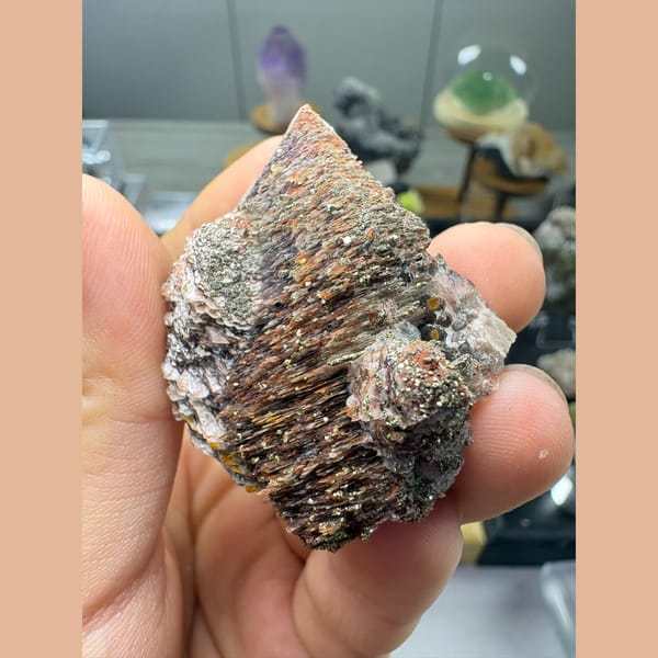 Tower-like calcite coated with hematite and pyrite — alternate view