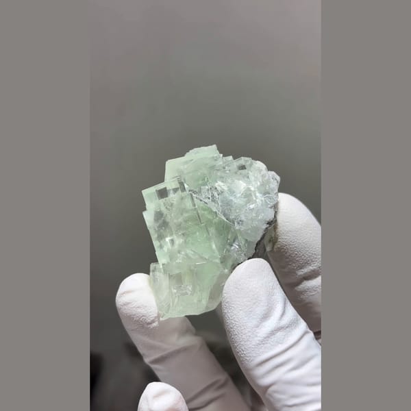 Translucent mint green cubic fluorite cluster from Zhejiang — alternate view