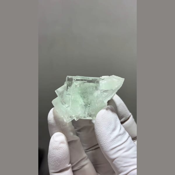 Translucent mint green cubic fluorite cluster from Zhejiang — alternate view