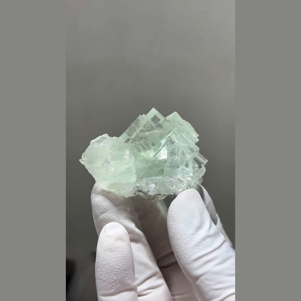 Translucent mint green cubic fluorite cluster from Zhejiang — detail view