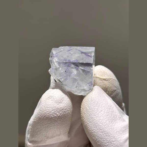 Glassy pale lilac fluorite cube from Zhejiang — complete view